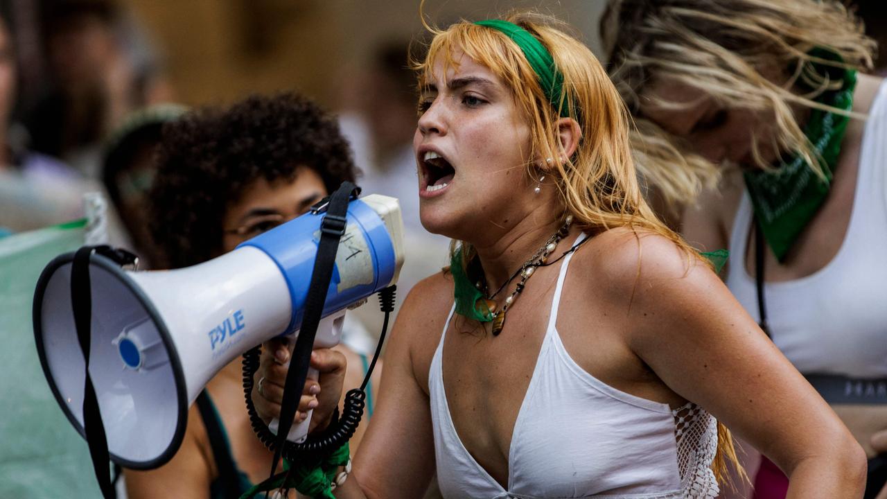 An abortion rights activist speaks into a megaphone during a protest in Washington, DC. Picture: Samuel Corum / AFP