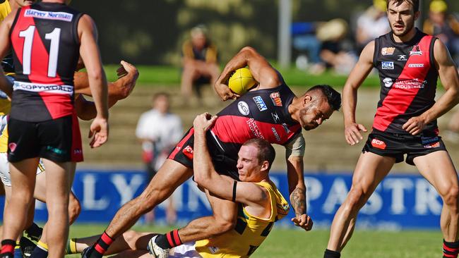 Eagle Patrick Giuffreda tackles West's Zachary Bates in their big win at Richmond Oval. Picture: Tom Huntley