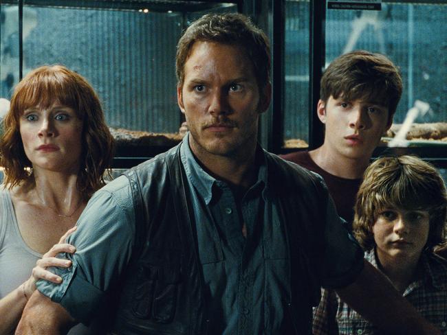 This photo provided by Universal Pictures shows, Bryce Dallas Howard, from left, as Claire, Chris Pratt as Owen, Nick Robinson as Zach, and Ty Simpkins as Gray, in a scene from the film, "Jurassic World," directed by Colin Trevorrow, in the next installment of Steven Spielberg's groundbreaking "Jurassic Park" series. The Universal Pictures 3D movie releases in theaters on June 12, 2015. (Universal Pictures/Amblin Entertainment via AP)