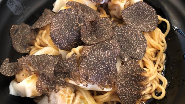 Happy Belly Chinese Restaurant’s dry noodles with prawns and pork wontons, and fresh WA black truffle. Picture: Supplied