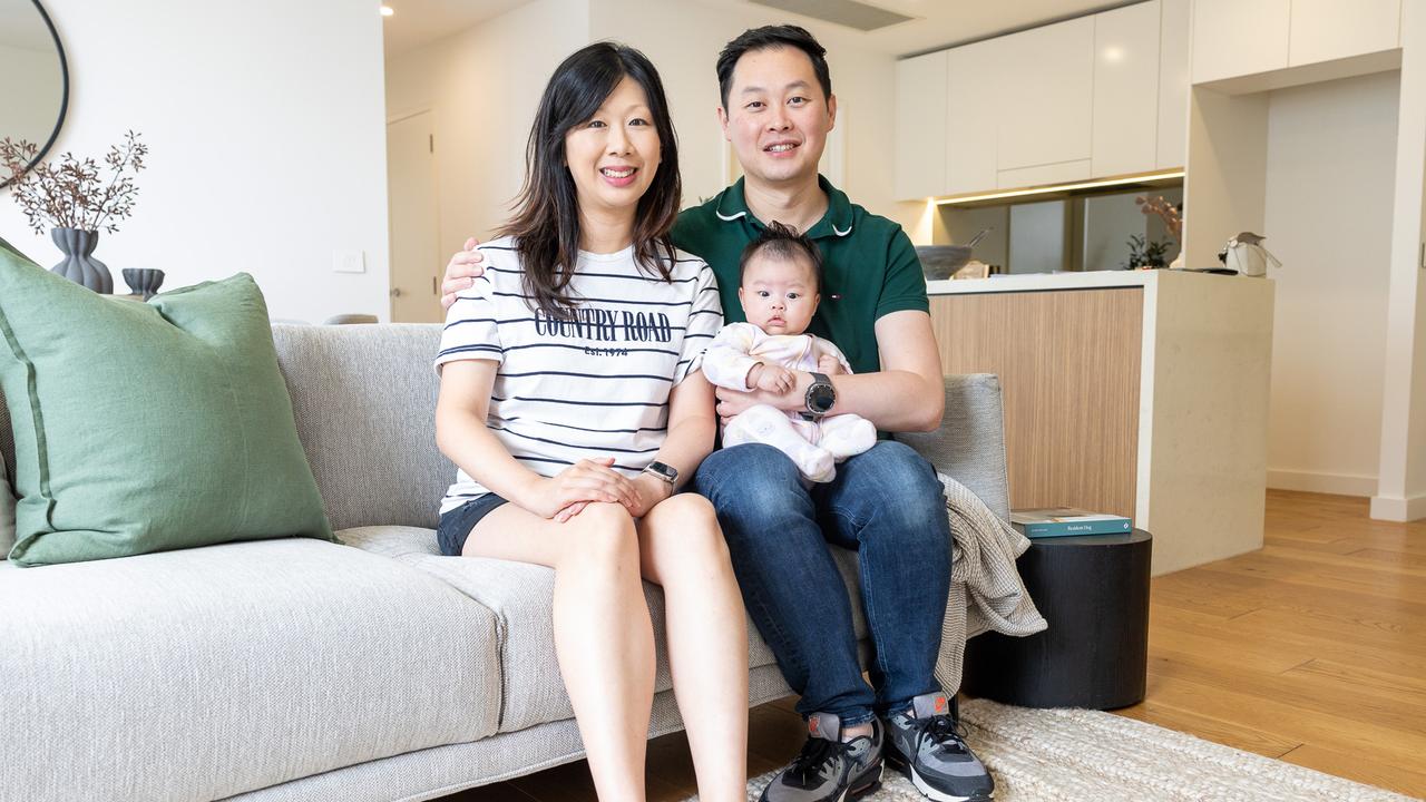 Jessica and George Liang, with baby Olivia, are selling up their unit in Wentworth Point but said finding a larger home was difficult. Picture Thomas Lisson