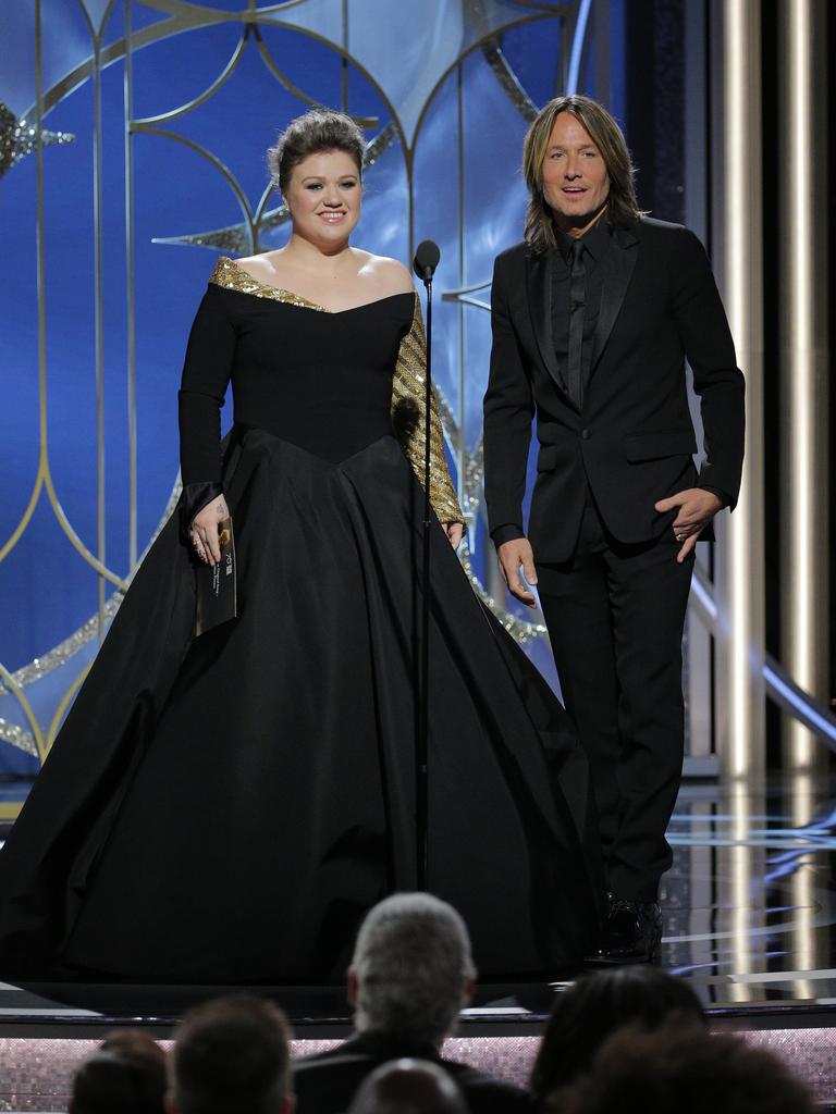 Kelly Clarkson and Keith Urban speak onstage during the 75th Annual Golden Globe Awards at The Beverly Hilton Hotel on January 7, 2018 in Beverly Hills, California. Picture: Getty