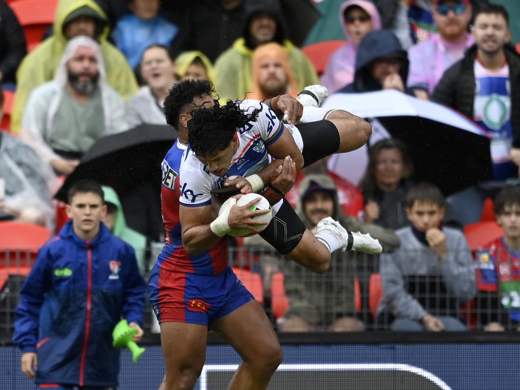 Watene-Zelezniak is tackled in the air by Marzhew. Picture: NRL Imagery