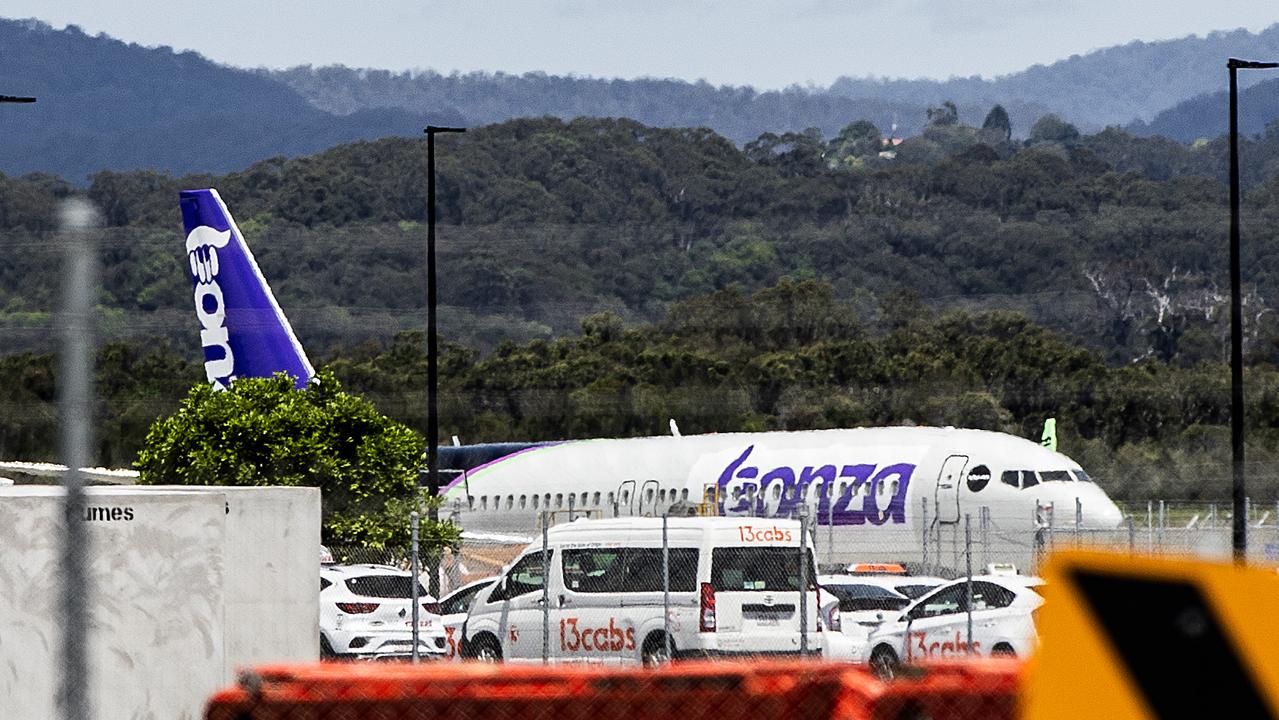 Bonza plane sitting on the tarmac at Gold Coast Airport while the airline awaits CASA approval.