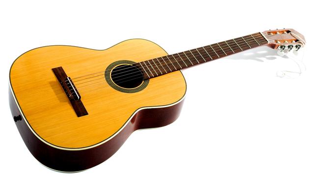 The teen thug used an acoustic guitar like this one as a weapon in three separate attacks.