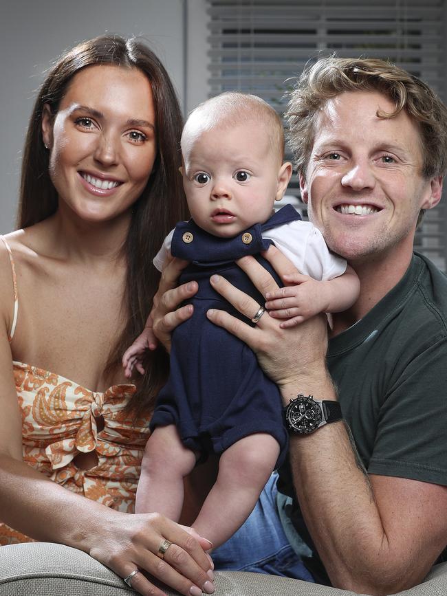 Belinda and Rory at home with son Sonny ahead of Rory’s 200th game. Picture Sarah Reed.