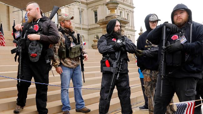 Michael Null, right, and William Null, left, at the American Patriot Rally, organised by Michigan United for Liberty, to demand in Lansing, Michigan, on April 30. The Nulls were charged last week for their alleged roles in the plot to kidnap Michigan Governor Gretchen, according to the FBI. Picture: AFP