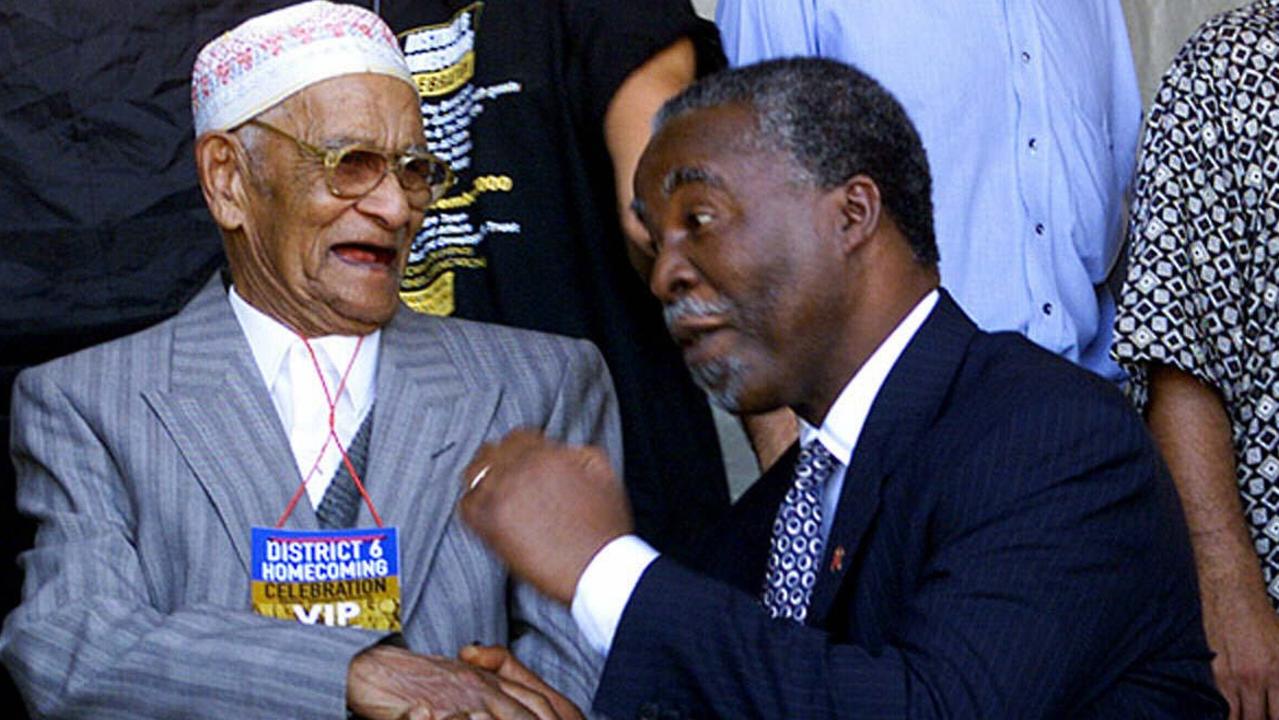 In 2000, South African’s then-president Thabo Mbeki, right, with Ismail Bessier, 100, the oldest District Six former resident. Pictures: AP PHOTO/Obed Zilwa