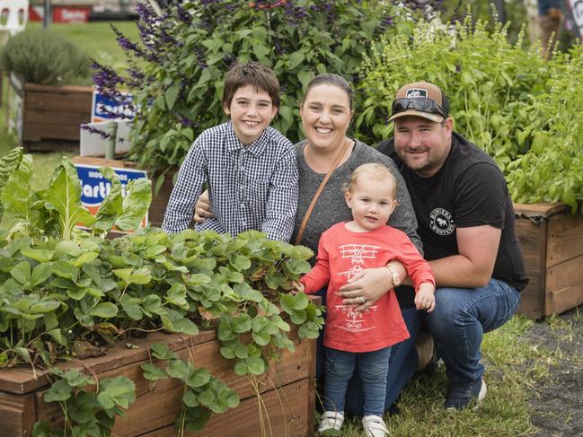 Courtney and Thomas Boom with sons Rylee (left) and Toby-Joe Boom in the Pohlmans Vegie Patch area at the Toowoomba Royal Show, Saturday, April 1, 2023. Picture: Kevin Farmer