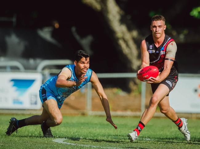 Nathan Scagliarini (right) playing for the Tiwi Bombers in Darwin. Picture: Glenn Campbel