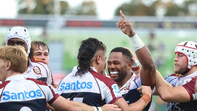 Filipo Daugunu of the Reds celebrates a try during match against the Western Force. Photo by Janelle St Pierre/Getty Images