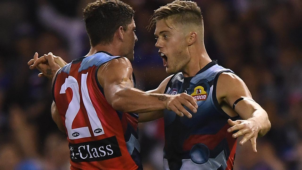 Tom Liberatore and Josh Schache celebrate an early goal.