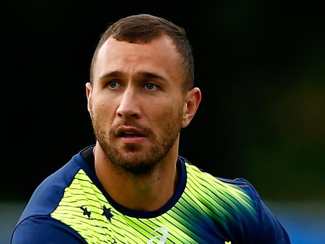 BATH, ENGLAND - SEPTEMBER 15: Quade Cooper of Australia in action during a training session at the University of Bath on September 15, 2015 in Bath, United Kingdom. (Photo by Dan Mullan/Getty Images)