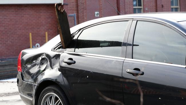 Homes and vehicles were damaged as the result of wild winds. Picture: Calum Robertson