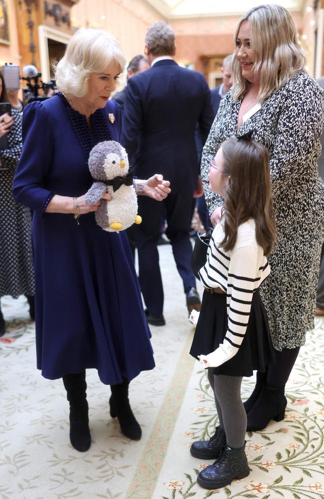 Queen Camilla speaks with guests during a reception for the BBC's 500 Words Finalists at Buckingham Palace. Picture: AFP