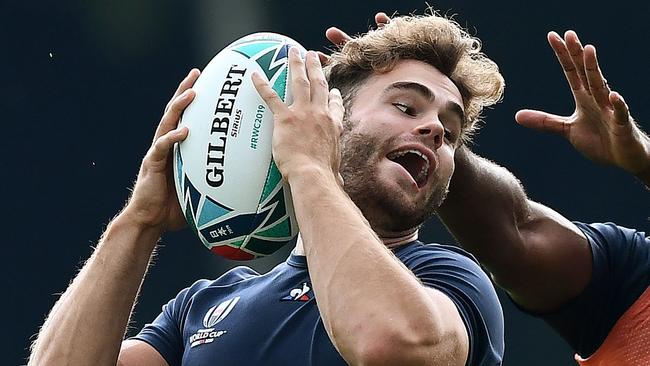 France winger Damian Penaud catches the ball during training at Fuji Hokuroku Park.