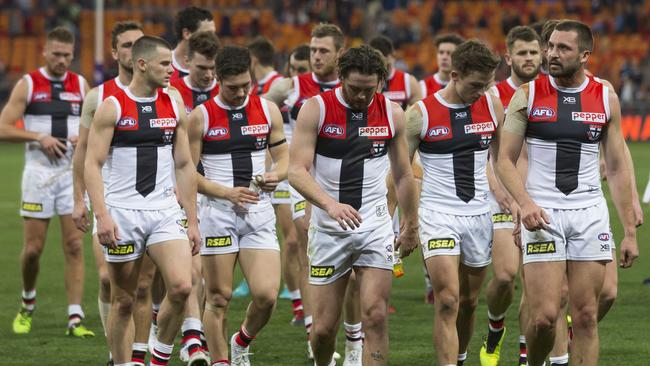 Dejected St Kilda players walk off after the loss to GWS.