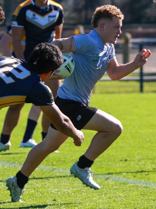 Central Coast Sports College’s Lachlan Simpson during the side’s win over reigning national champions Westfields Sports High. Picture: Justin Lloyd.