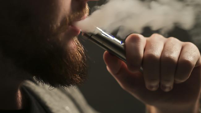 Young smokers see e-cigarettes as a healthy alternative and a way to dodge public smoking bans, a study has found. <i>Picture: Mark Cranitch</i>