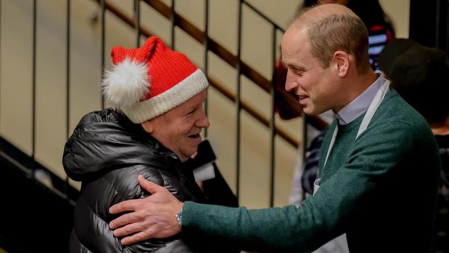 The Prince of Wales has joined a charity event to help volunteers prepare and serve food for homeless people.