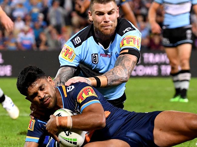 BRISBANE, AUSTRALIA - MAY 09: Tyrone Peachey of the Titans scores a try during the round nine NRL match between the Gold Coast Titans and the Cronulla Sharks at Suncorp Stadium on May 09, 2019 in Brisbane, Australia. (Photo by Bradley Kanaris/Getty Images)