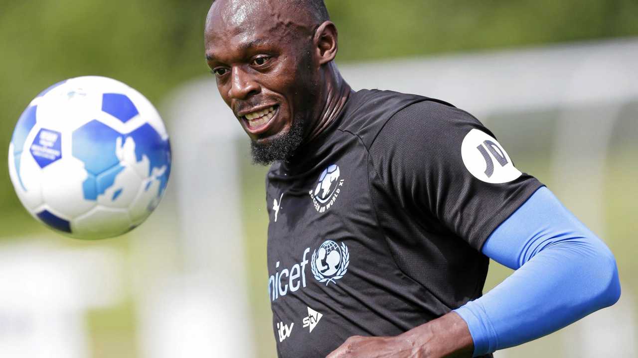 CHARITY MATCH: Rest of the World player Usain Bolt takes part in a training session ahead of the Soccer Aid for UNICEF match earlier this year. Picture: Henry Browne