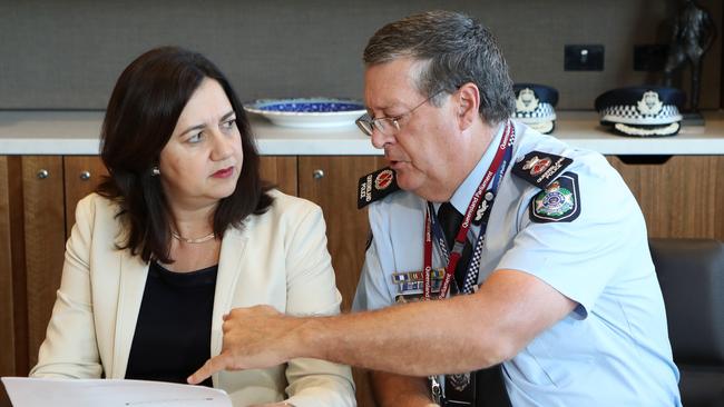 Premier Annastacia Palaszczuk and Police Commissioner Ian Stewart with the Queensland Disaster Management Committee. Pic Darren England.