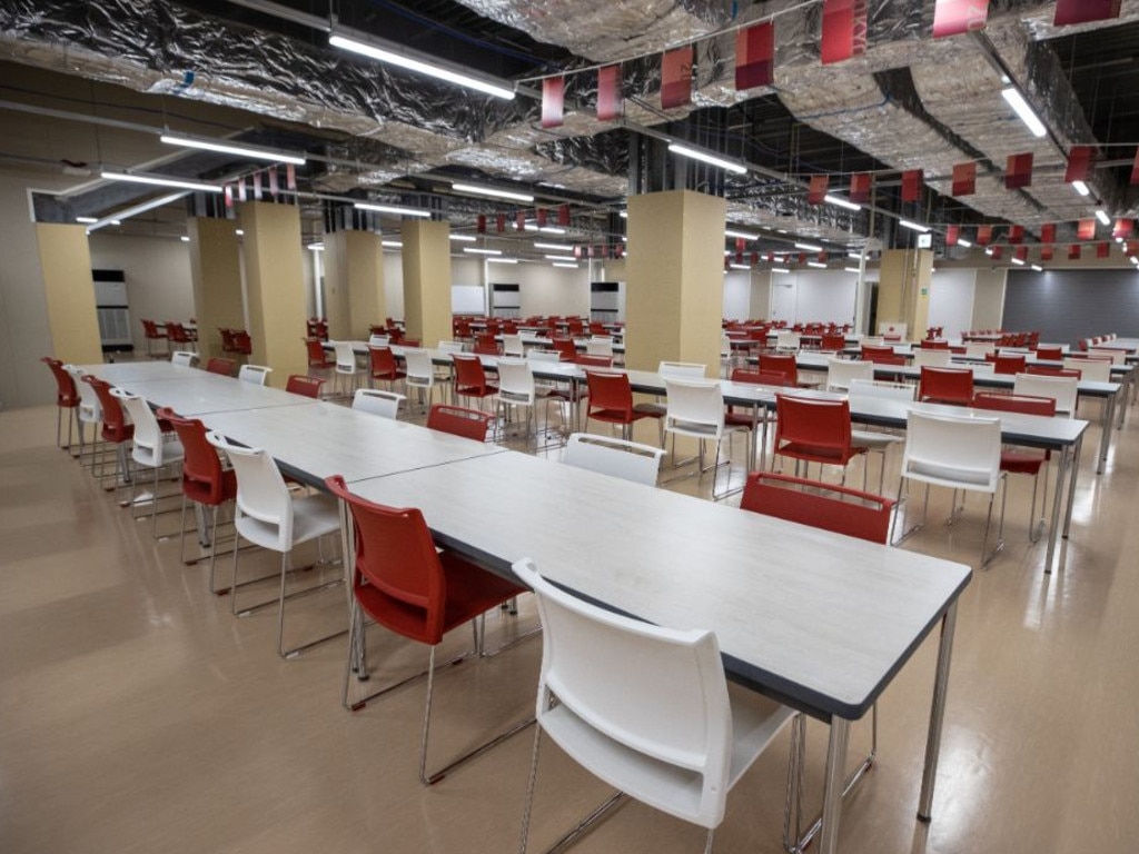 The Tokyo village dining hall. (Photo by Akio KON / POOL / AFP)