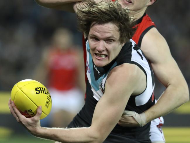 Port Adelaide’s Jared Polec under pressure during the Power’s loss to Essendon.