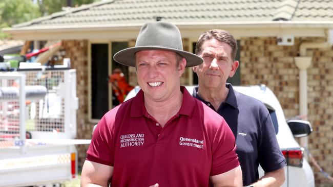 Premier Steven Miles and deputy premier Cameron Dick, at a house whose roof was impacted be a fallen tree on Davidson Rd, Jimboomba, on Tuesday, December 26. Photo Steve Pohlner