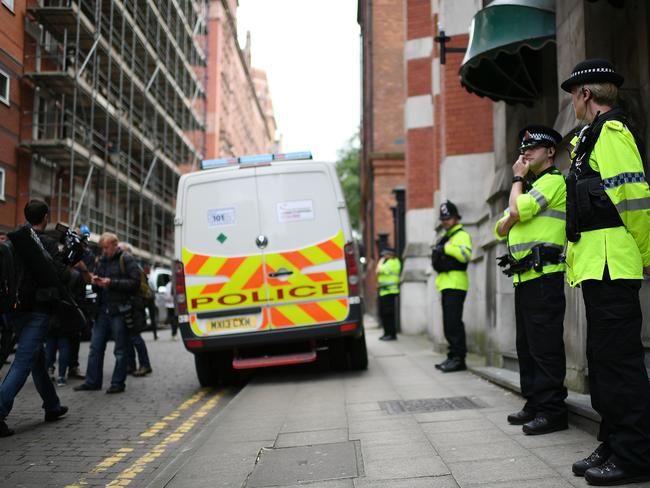 Police guard the entrance to Granby House in the city centre following an armed raid. Picture: Jeff J Mitchell/Getty Images