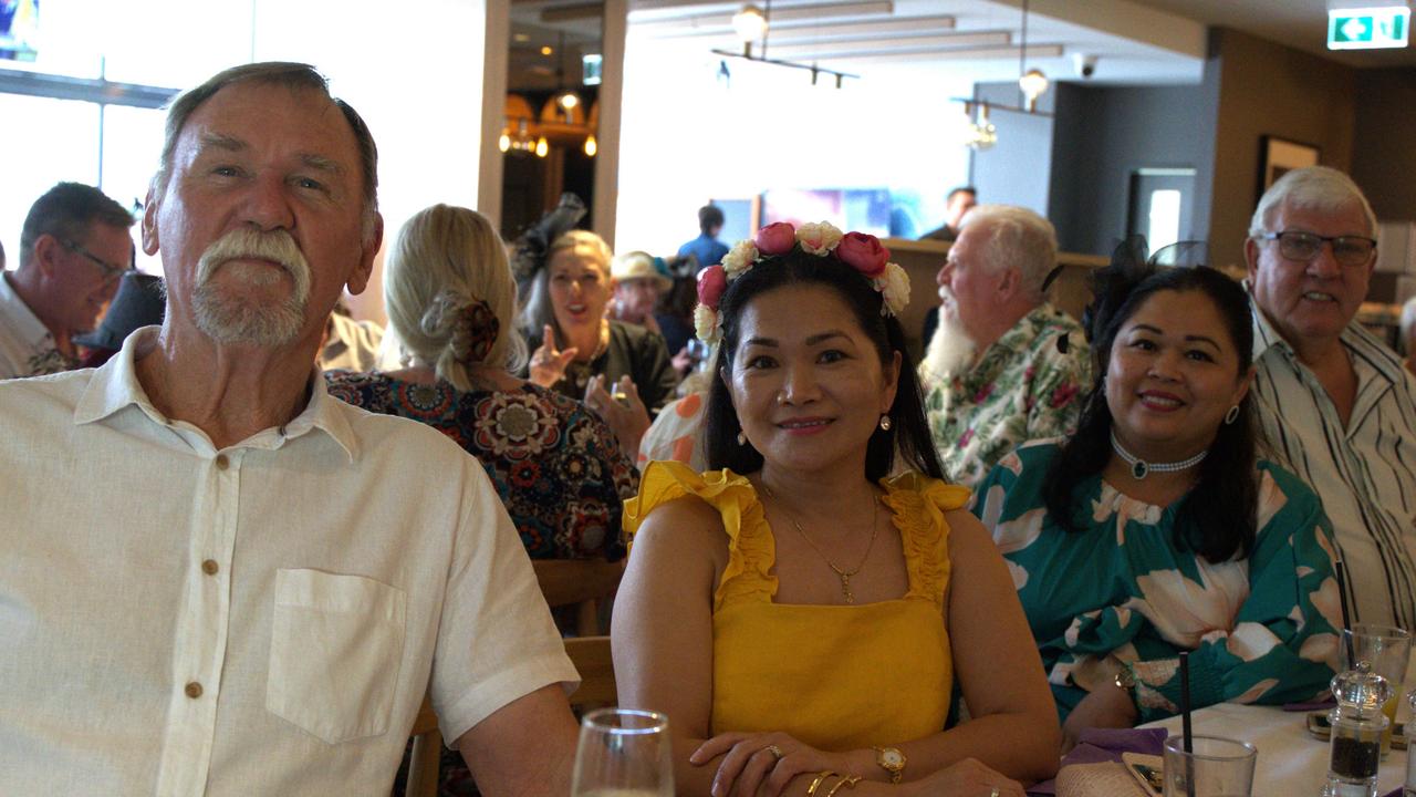 Gary Larsen, Elena Gear and friend at the Gympie RSL during the Melbourne Cup Races on November 7, 2023.