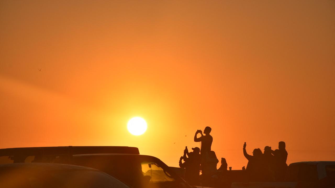 Elon Musk’s SpaceX Starship exploded minutes after liftoff from Texas. People gathered at a nearby beach in Matamoros, Mexico, to watch the launch. Picture: Photo by DIEGO CRUZ / AFP