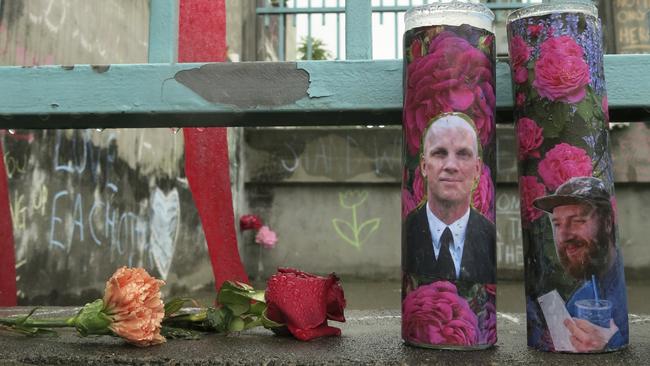 A memorial to the two men who lost their lives defending two teenage girls from racist harassment in Portland, Oregon. Veteran Ricky Best, 53 (left), was a father of four, and Taliesin Myrddin Namkai-Meche, a 23 year old student. (Pic: Gillian Flaccus/AP)