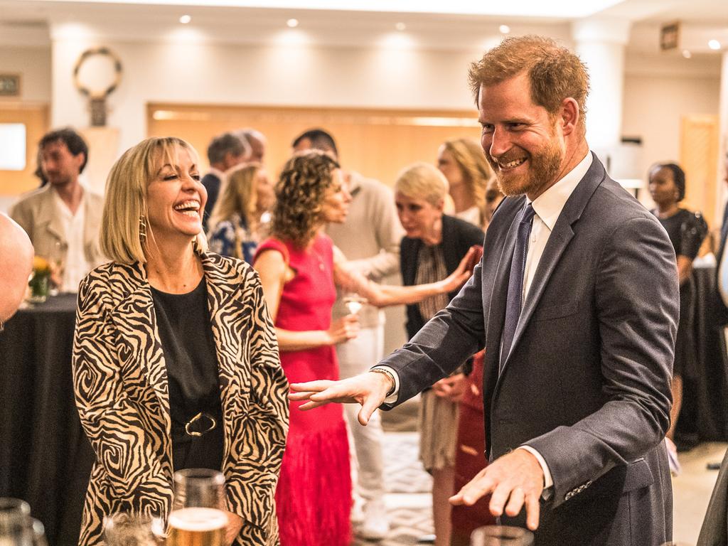 Continuing his solo tour of Africa, Prince Harry works the room at a reception in Johannesburg, South Africa. Picture: Brian Otieno/Getty Images for Sentebale