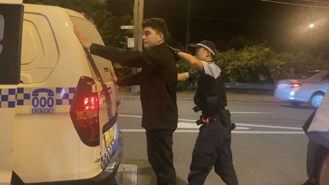 Drew Pavlou shared a photo of his arrest to his Twitter page. Picture: twitter.com/drewpavlou