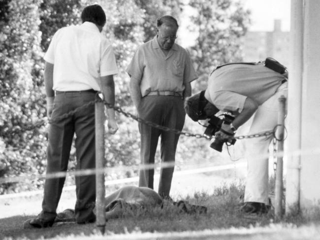 Investigators at the scene of Edward Baldock's murder.