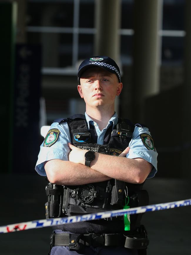 A police officer posted outside Auburn police station on Tuesday. Picture: NCA Newswire/ Gaye Gerard