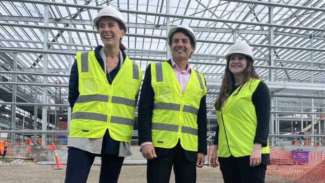 Moderna executives Chantal Friebertshaeuse, Michael Azrak and Arpa Garay at the company's new factory which is under construction in Melbourne.