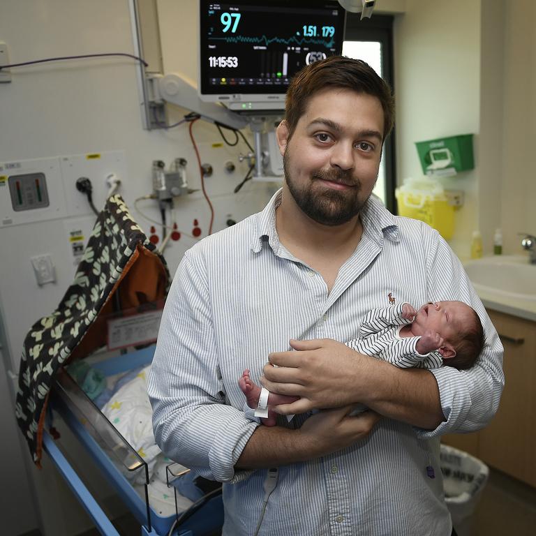 Matt Avramovic with son Hugo in the special care nursery at Townsville University Hospital.