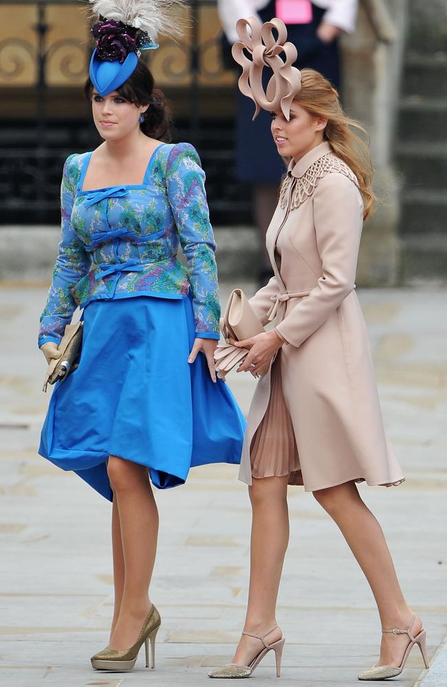 As unmarried royals Eugenie and Beatrice have had to be content with wearing questionable hats. Picture: Pascal Le Segretain