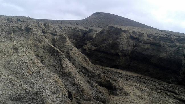 The surface of the island looks like something out of space.