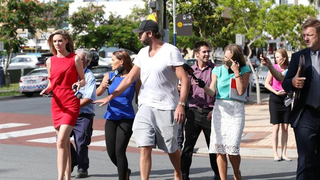 The media trailing Grant Hackett after his arrest and release on the Gold Coast. (Pic: Nigel Hallett)