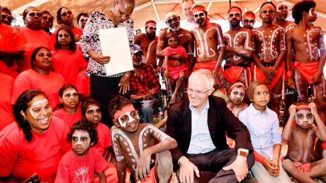 Prime Minister Malcolm Turnbull Election 2016. PM Malcolm Turnbull, traditional owner Raylene Singh and the Kenbi dancers in the electorate of Solomon, Darwin attending the Kenbi Land Claim Title Deed Handover at Wagait beach, Mandorah.