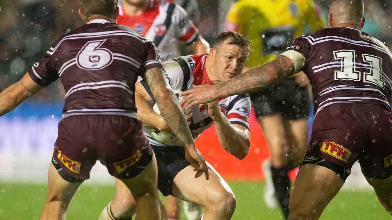 Brett Morris sustained a knee injury after getting it caught in the sodden turf at Brookvale Oval. (AAP Image/Steve Christo)