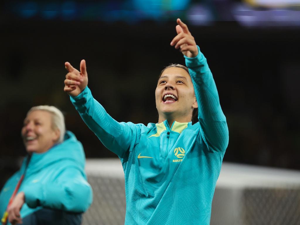 Sam Kerr laps up the victory with the Melbourne crowd. Picture: Robert Cianflone/Getty Images.