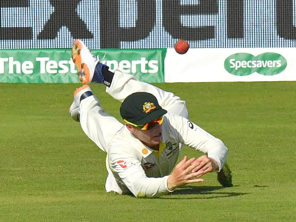 Australia's Marcus Harris cannot take a catch to dismiss England's Ben Stokes. (Photo by Anthony Devlin / AFP)