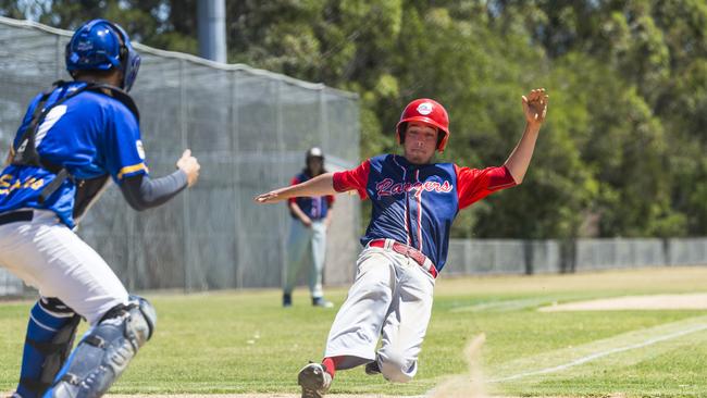 Brent Locke slides in safe for Toowoomba Rangers. Picture: Kevin Farmer