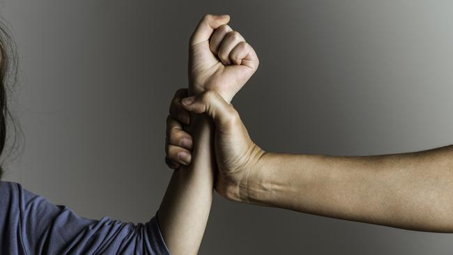 istock generic: woman, abuse, DV, domestic violence, harassment, sexual harassment. Parent is holding her little girls arm and is about to use violence. Representing child abuse and domestic violence. . Picture: istock