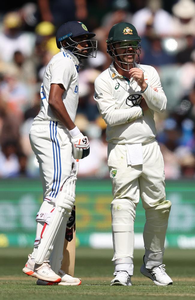 Travis Head and Mohammed Siraj in the middle of the Adelaide Oval. Picture: Paul Kane/Getty Images.